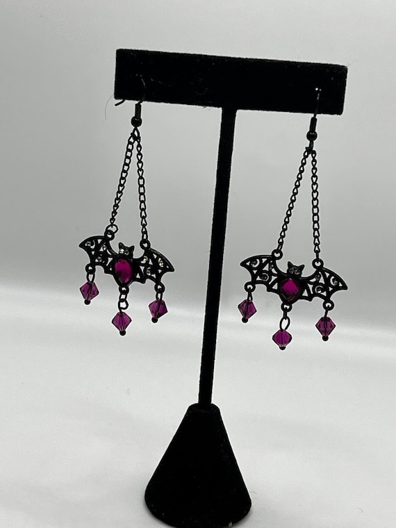 Black and pink bat earrings