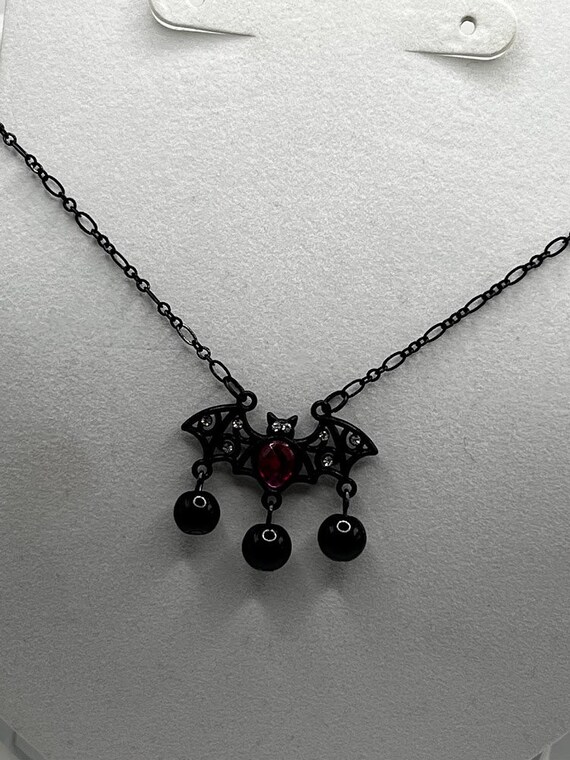 18" with 2" extender bat necklace