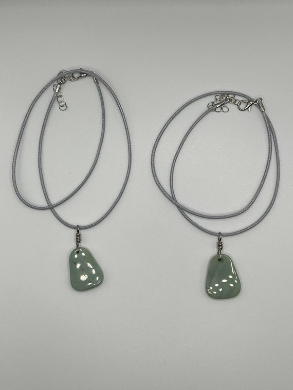 Green aventurine drop on gray cord