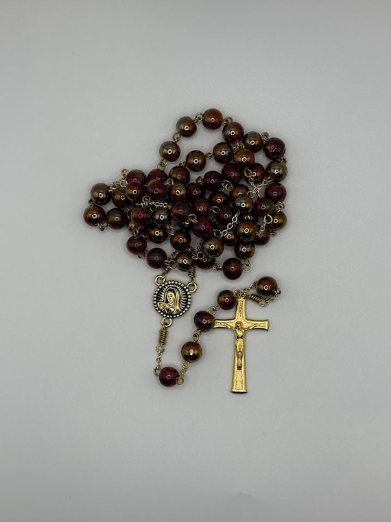23" golden red bead rosary with Madonna/Rose center and textured crucifix