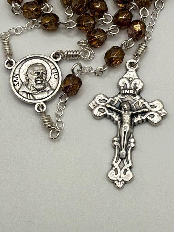 27.5" brown glass bead 7 decade crown rosary with relic Padre Pio center and fancy crucifix