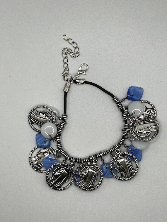 8" blue and white bead drop and Madonna charm bracelet with 2" extender