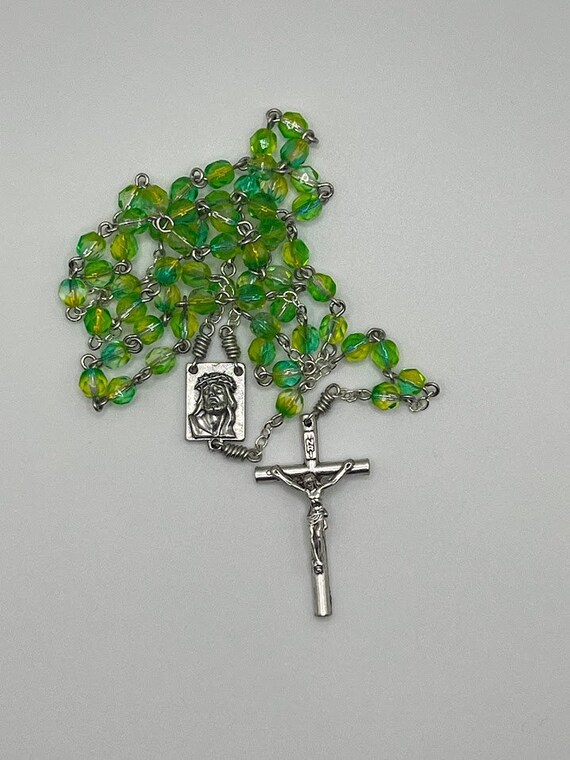 20" green/yellow glass bead rosary with Crucified Christ center and round crucifix