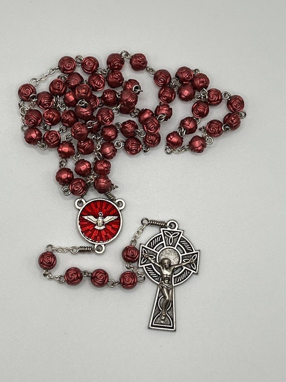 23.5" rose bead rosary with enamel Holy Spirit center and Celtic crucifix