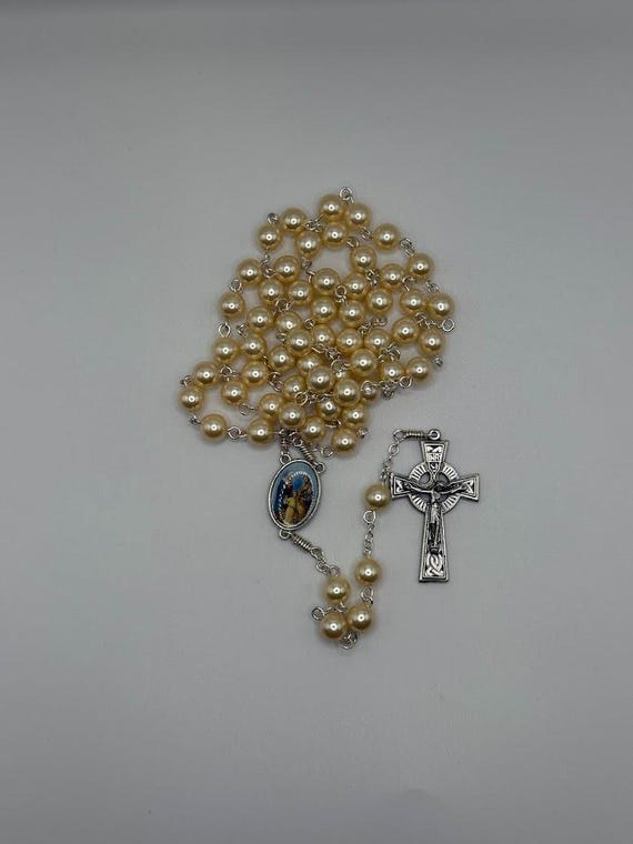 23.5" cream pearl bead rosary with Holy Family center and Celtic crucifix