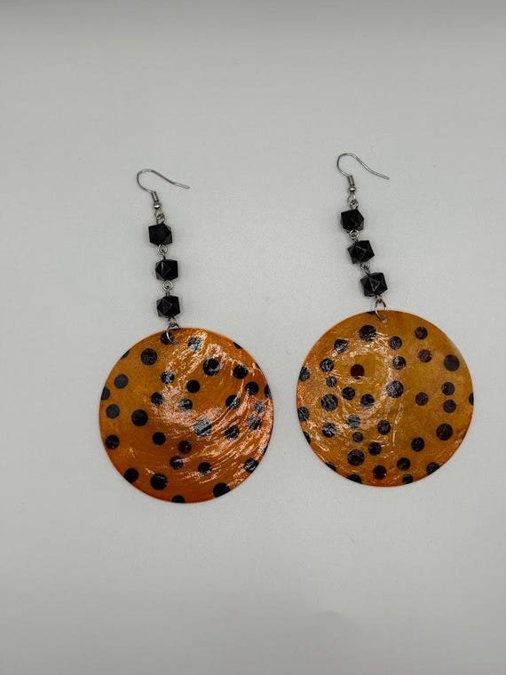 Orange and black dot earrings