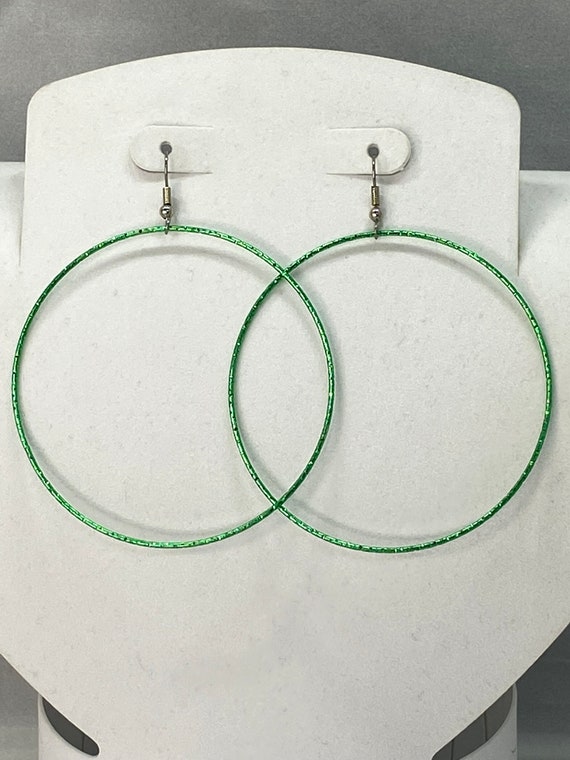 large green hoop earrings