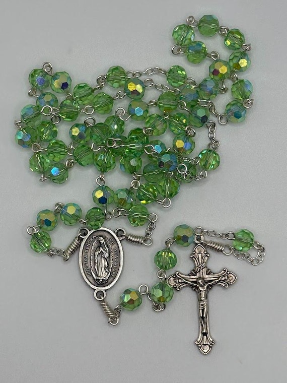 24" green crystal bead rosary with Our Lady of Guadalupe center and Vatican crucifix