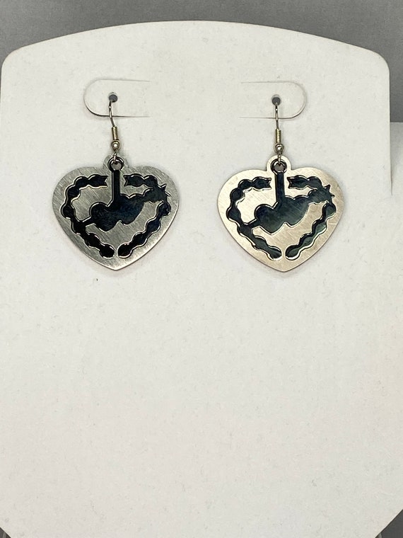 Stainless steel illusion earrings