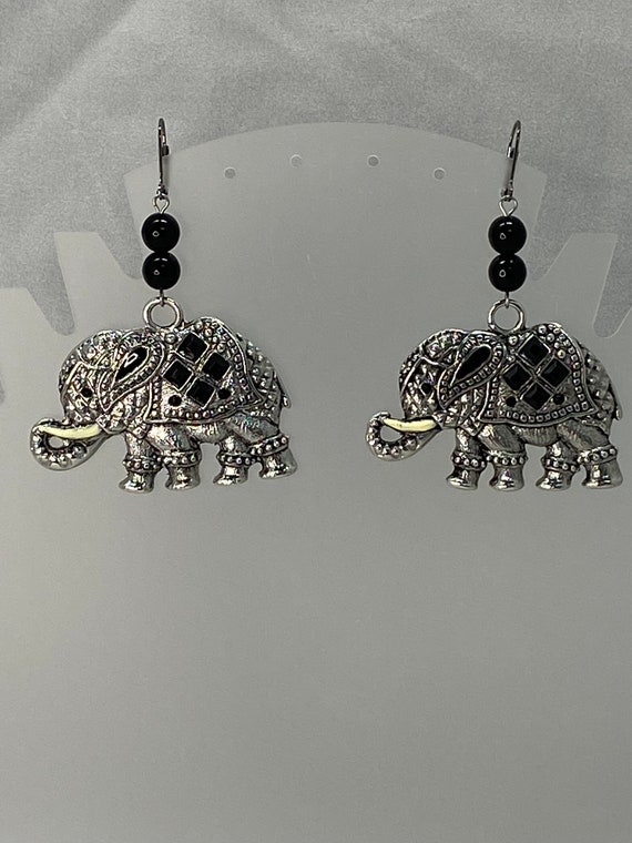 Silver elephant drop earrings