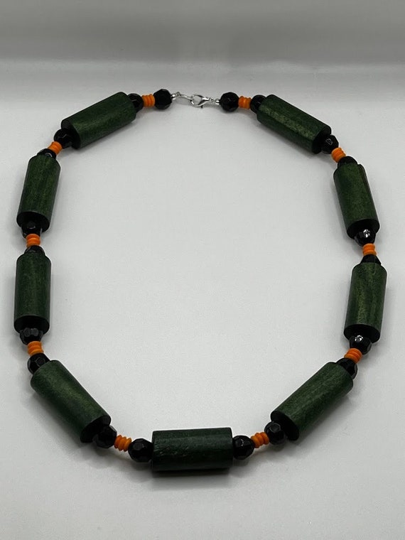 22.5" green, black, and orange bead necklace