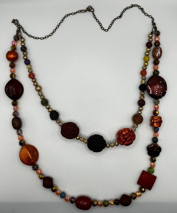 26" - 34" multi strand reds necklace