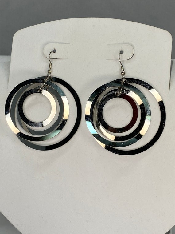 Stainless steel multi frame earrings