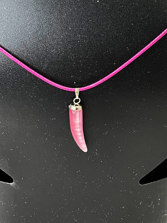 18" pink cat eye pendant on pink cord