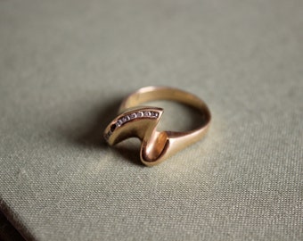 Woman's 14k Gold Ring with Channel Set Diamonds