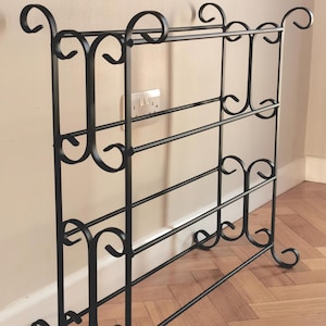 metal shoe rack, wrought iron, hallway, boots, custom, shoe storage, scrolls. Metal shoe storage, shoe stand, boot rack, porch, entry hall