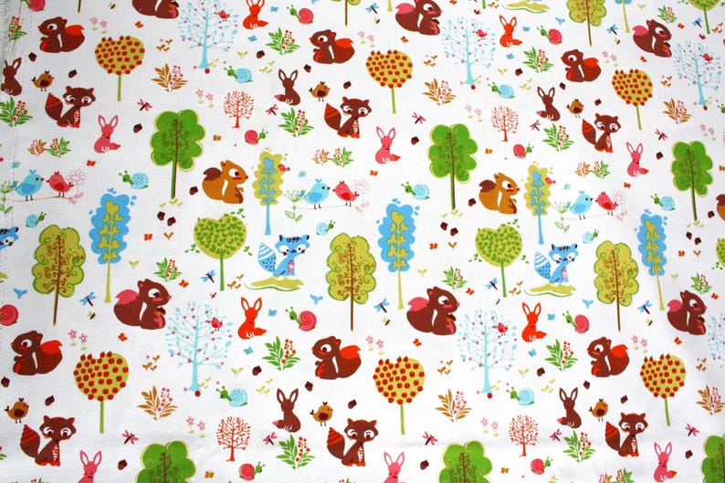 May include: A white fabric featuring a repeating pattern of brown squirrels, blue foxes, pink rabbits, and red birds. The design includes green and light blue trees, small snails, and colorful foliage scattered across the surface.