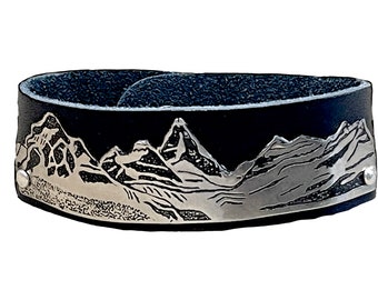 Mt Assiniboine etched in German Silver on leather cuff