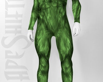 May include: A full-body green jumpsuit featuring a printed fur texture and a muscular physique design. The garment has long sleeves and long pant legs, covering the torso, arms, and legs. The word SHAPESHIFTER is visible in the background.