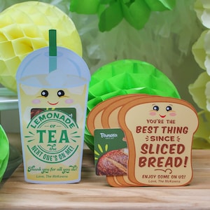 May include: Two gift cards with a fun design. One card features a cartoon lemonade or tea cup with the text "Lemonade or Tea the next one's on me!" and "Thank you for all you do! Love, The McKowns". The other card features a cartoon slice of bread with the text "You're the best thing since sliced bread! Enjoy some on us! Love, The McKowns".