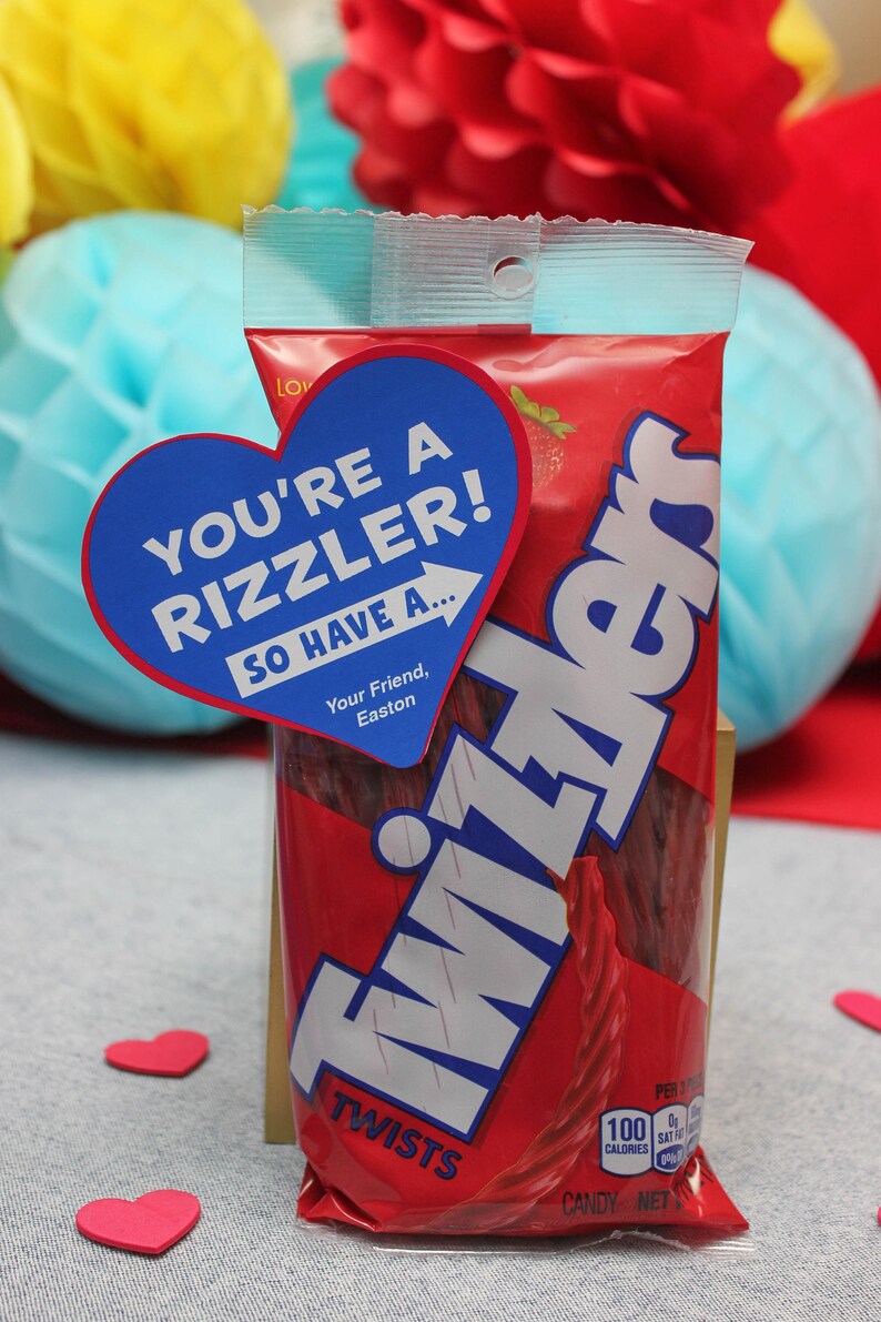 May include: A red bag of Twizzlers candy twists with a blue heart-shaped sticker that says "You're a rizzler! So have a..." and "Your Friend, Easton".