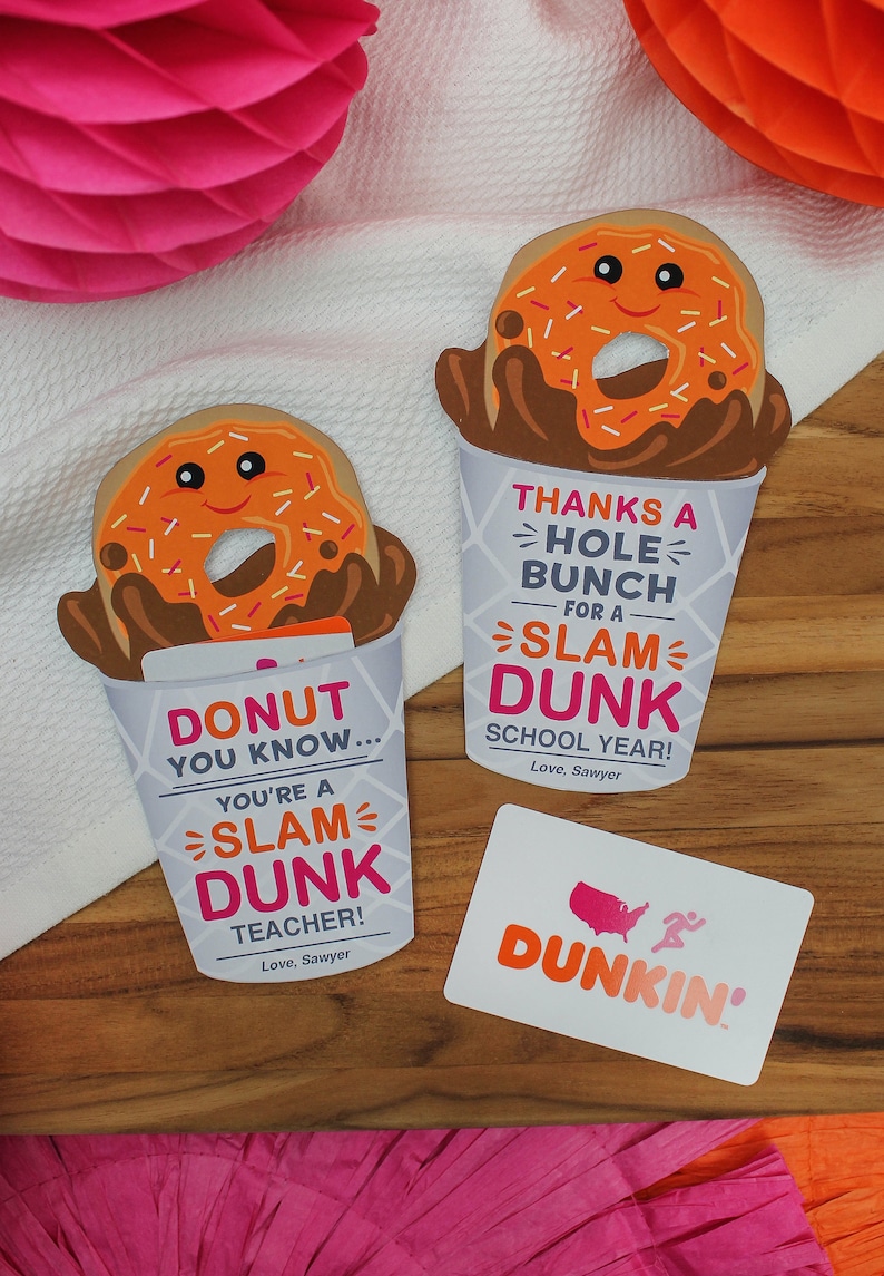 May include: Two donut-themed gift cards with the text "Donut you know... you're a slam dunk teacher!" and "Thanks a hole bunch for a slam dunk school year!"  The cards are decorated with a cartoon donut and a cup of coffee. A Dunkin' Donuts gift card is also shown.