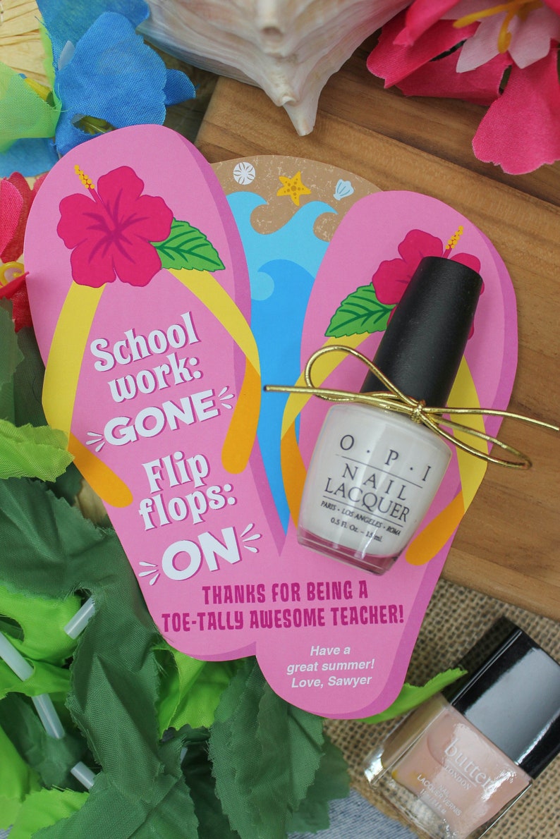 May include: Pink and blue flip flop shaped card with the text "School work: GONE Flip flops: ON" and the message "Thanks for being a toe-tally awesome teacher! Have a great summer! Love, Sawyer". The card is decorated with a pink hibiscus flower and a small bottle of white nail polish.