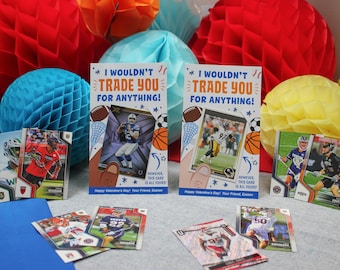 May include: Two Valentine's Day cards with the text "I wouldn't trade you for anything!" and a sports card inside each. The cards are surrounded by colorful paper decorations.