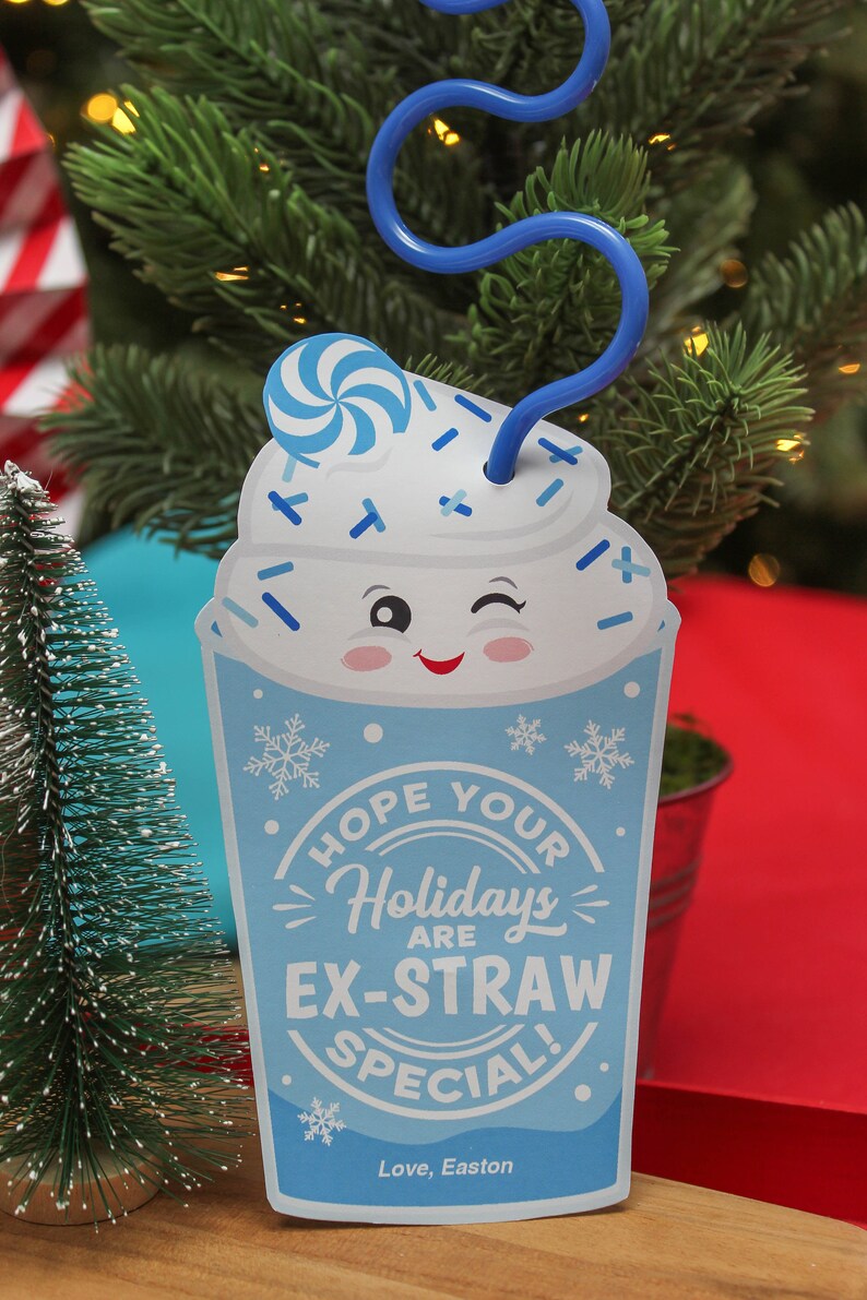 May include: A blue and white Christmas card with a cartoon image of a milkshake with a candy cane on top. The card says "Hope your Holidays are Ex-Straw Special!" and is signed "Love, Easton".