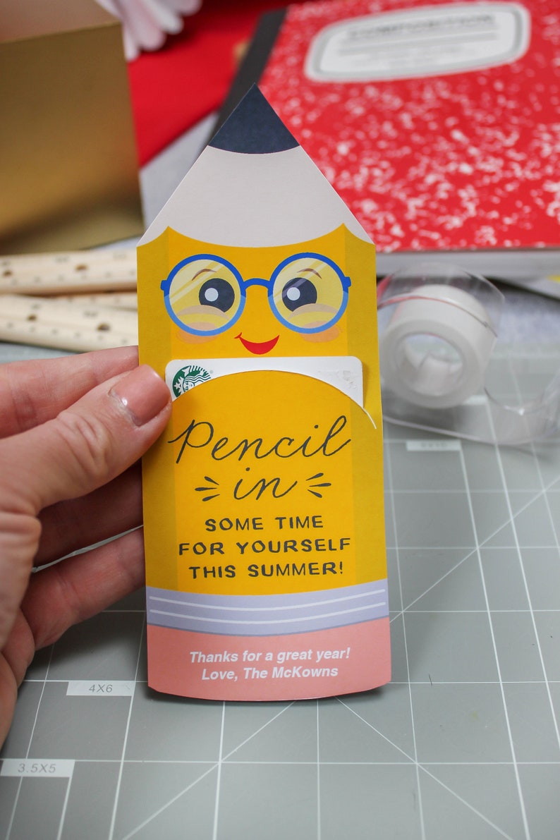 May include: A yellow pencil-shaped gift card holder with a smiling face wearing blue glasses. The text reads "Pencil in some time for yourself this summer!" and "Thanks for a great year! Love, The McKowns."