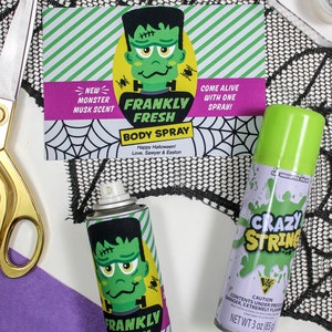 May include: Two green and white spray bottles with monster-themed labels. One bottle says "Frankly Fresh Body Spray" and the other says "Crazy String".