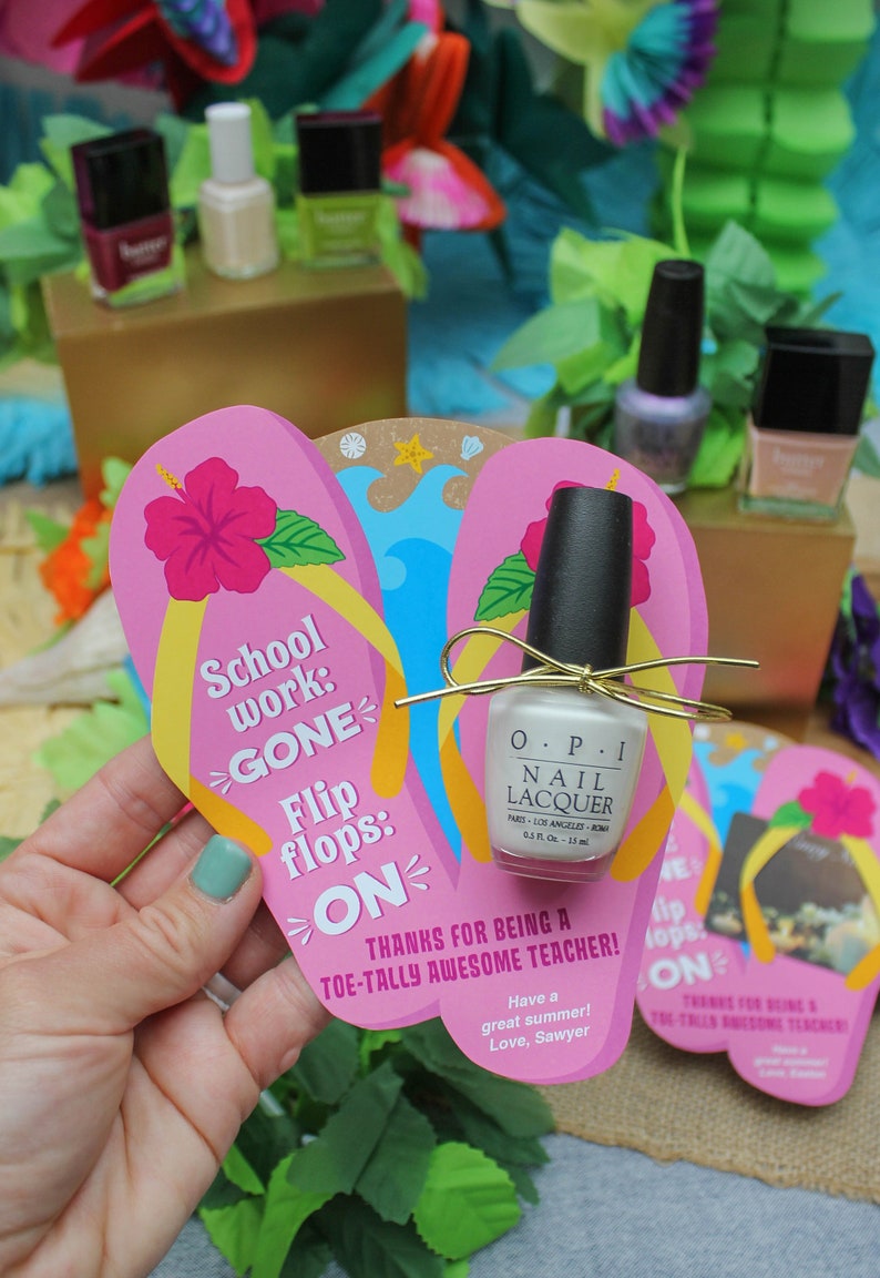 May include: Pink and blue flip flop shaped card with the text "School work: GONE Flip flops: ON" and the message "Thanks for being a toe-tally awesome teacher! Have a great summer! Love, Sawyer". A clear bottle of OPI nail lacquer is attached to the card with a gold ribbon.