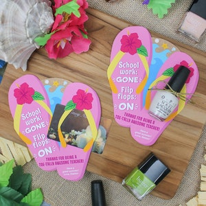 May include: Two pink flip-flop shaped cards with the text "School work: GONE Flip flops: ON" and the message "Thanks for being a toe-tally awesome teacher!"  Each card has a small gift attached, one with a bottle of clear nail polish and the other with a gift card.