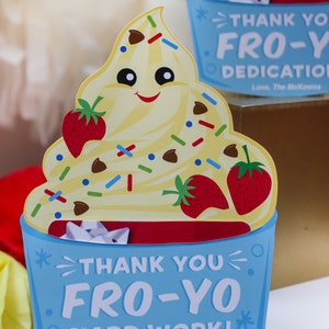 May include: A blue and white card shaped like a frozen yogurt cup with the text "Thank You Fro-Yo Hard Work!" and "Love, The McKowns".