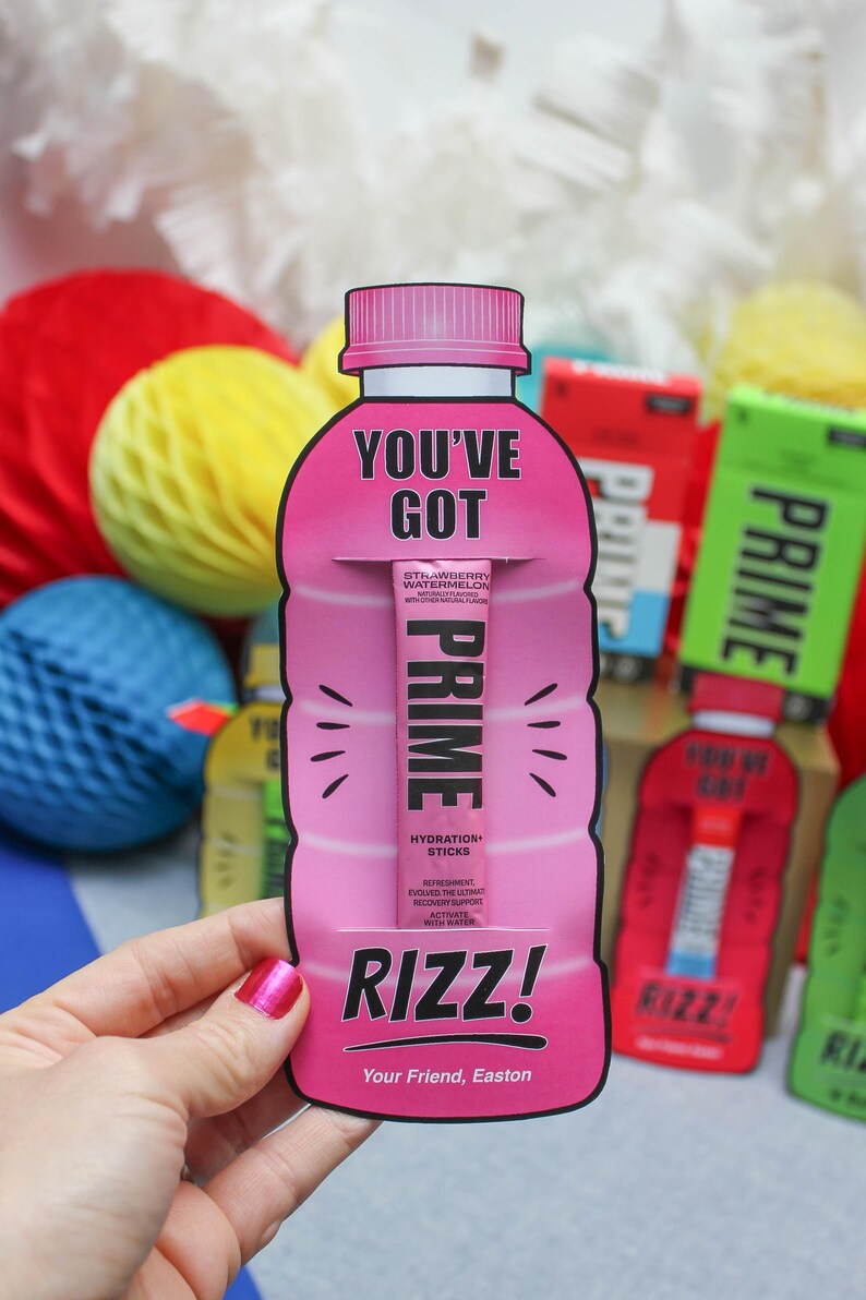 May include: Pink and black Prime Hydration Sticks packaging shaped like a water bottle with the text "You've Got Prime" and "Your Friend, Easton".