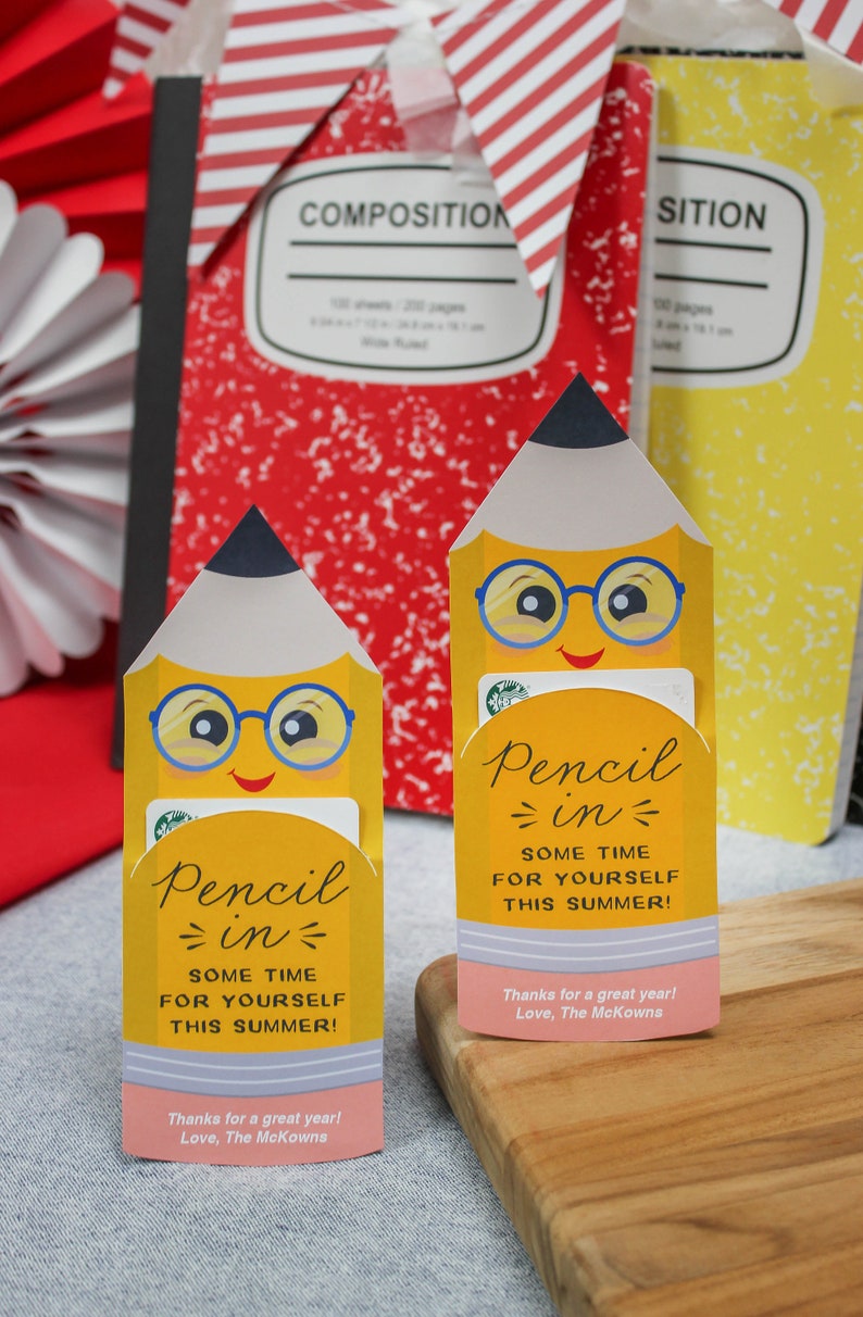 May include: Two yellow pencil-shaped gift card holders with smiling faces and blue glasses. The holders have the text "Pencil in some time for yourself this summer!" and "Thanks for a great year! Love, The McKowns."