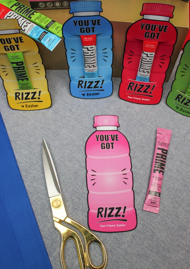 May include: Four colourful cardboard cutouts shaped like sports drink bottles with the words "You've Got Rizz!" and "Your Friend, Easton" printed on them. Each cutout has a slot to hold a single-serving sports drink powder packet.
