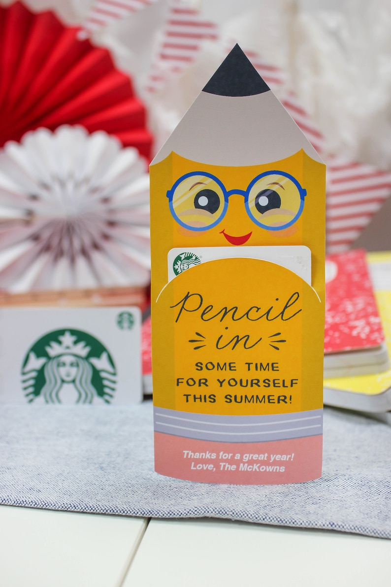 May include: A yellow pencil-shaped gift card holder with a smiling face and blue glasses. The text reads "Pencil in some time for yourself this summer!" and "Thanks for a great year! Love, The McKowns."