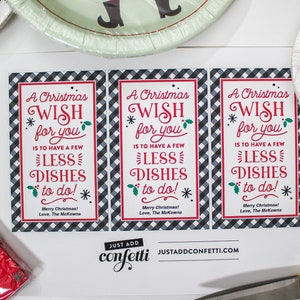 May include: Three printable gift tags with a black and white checkered background. The tags feature the text "A Christmas Wish for you is to have a few less dishes to do!" with red and green accents. The text "Merry Christmas! Love, The McKowns" is printed at the bottom of each tag.