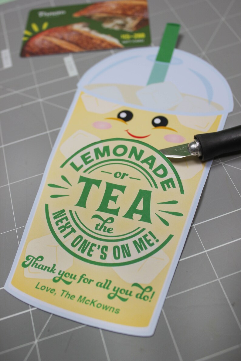 May include: A yellow and green card with a cartoon lemonade cup and the text "LEMONADE -or- TEA the NEXT ONE'S ON ME! Thank you for all you do! Love, The McKowns"
