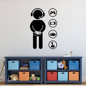 Gamer Silhouette with controllers decal for a Video Gamer Room Wall Decor - 22 inches tall 14.5 inches wide - Die Cut Vinyl Decal Sticker