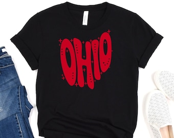 May include: Black t-shirt with a red heart-shaped graphic that says "OHIO" in a retro font.