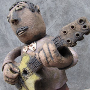 Ceramic Guitarist