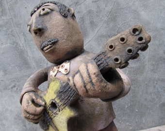 Fireclay Guitarist Sculpture, Handmade Ceramic Musician