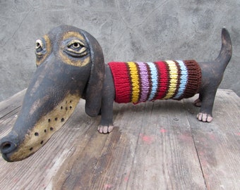 Ceramic Dachshund in a hand knitted striped sweater