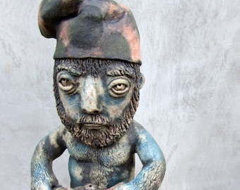Ceramic Garden Gnome with a chainsaw