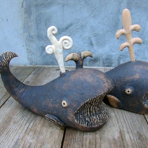 Ceramic Whale sculptures with ceramic or hand carved wooden water detail