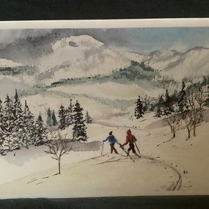 Carte de Noël vintage ski dans les montagnes enneigées