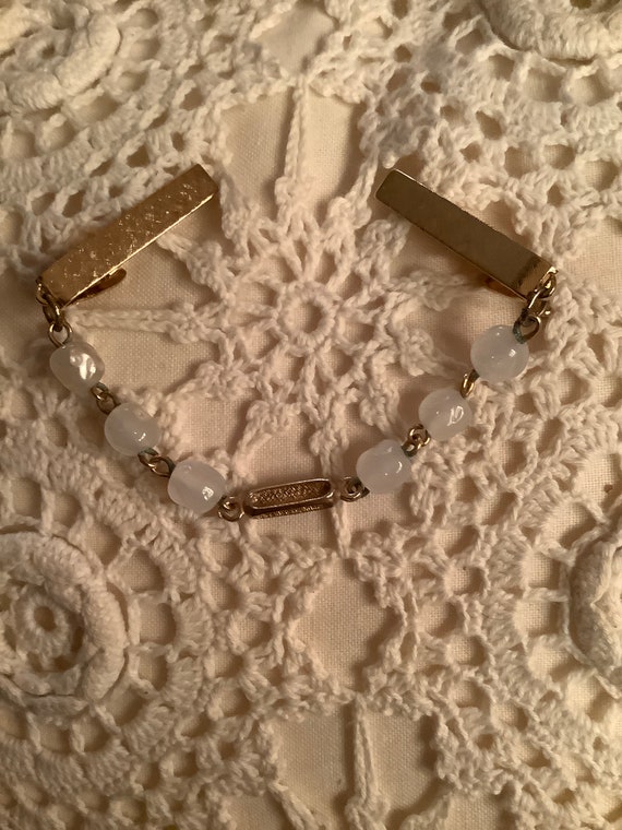 Vintage beaded sweater guard/clip goldtone