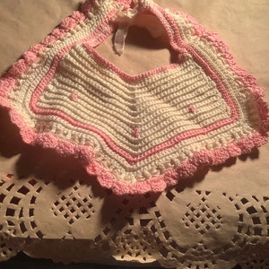Vintage hand knitted dolls bib